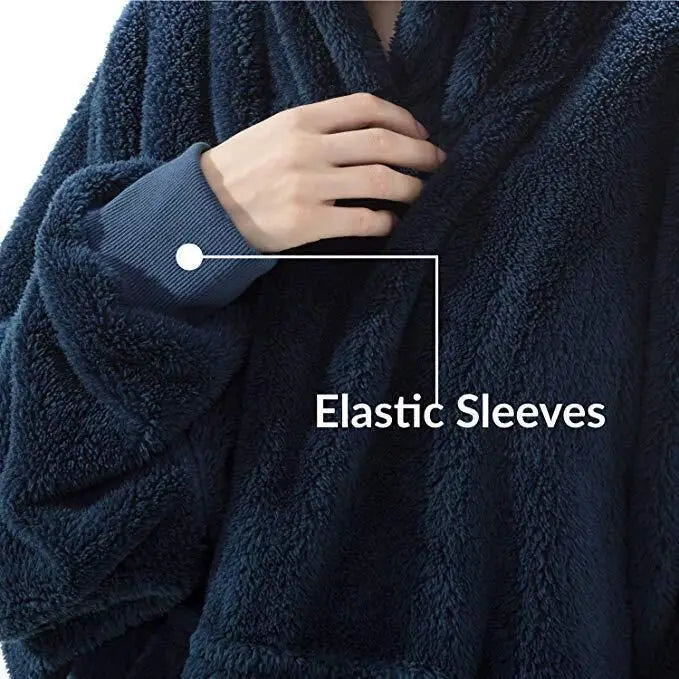 Navy blue fleece blanket with elastic sleeves and text highlighting feature.